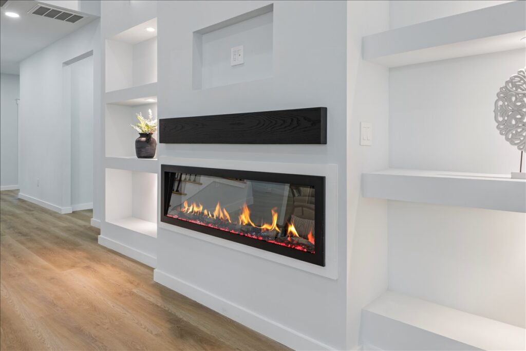 Modern living room fireplace in a newly completed home built by FEP Construction